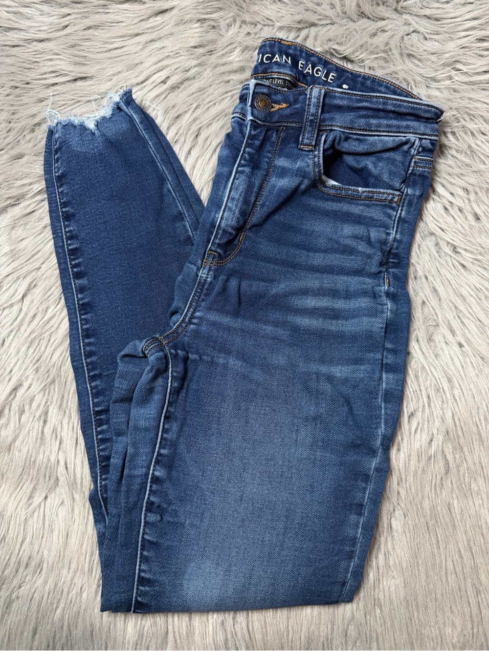 American Eagle Outfitters Dark Blue Skinny Jeans with Frayed Hem